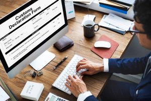 importer of record UK who pay VAT